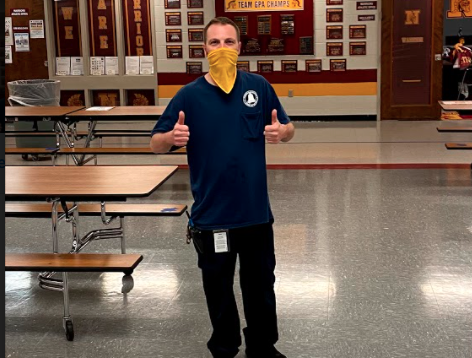 Shaun Stiffler cleans the commons after lunch. Photo by Ashley Kisor