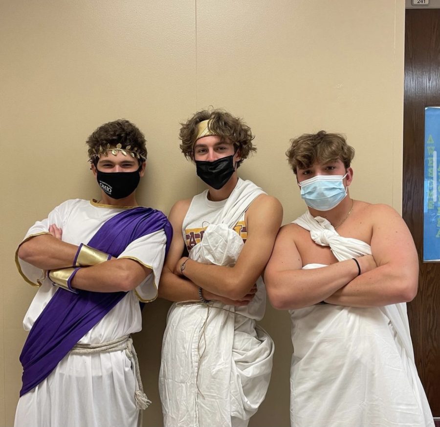 Max Lee (12), Nick Tener (12), and Mitchell Hamblin (12) dress up in the football night theme. The theme was toga night. 