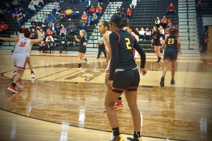 Maya+Collins+helps+her+teammates+play+in+unfamiliar+territory.+The+Westerville+North+Girls+Varsity+Basketball+Team+suffered+and+unfortunate+loss+to+South+51-30.