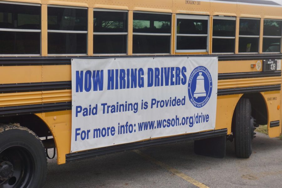 Bus that sits outside of Robert Frost Elementary School. Its here to promote the hiring of new bus drivers.