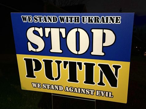 A yard sign showing the Ukraine flag saying the words ‘stop Putin’. The sign shows the support that people have had for Ukraine as of recently.