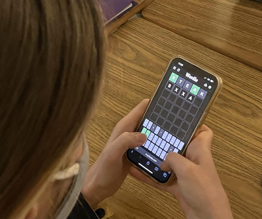 Emily Widman (12) plays Wordle in class. She's trying to figure out what the word of the day is. 