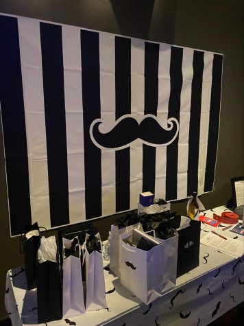 A gift table at a Movember event in Columbus Ohio. Movember is dedicated to bringing attention to mens mental and physical health.