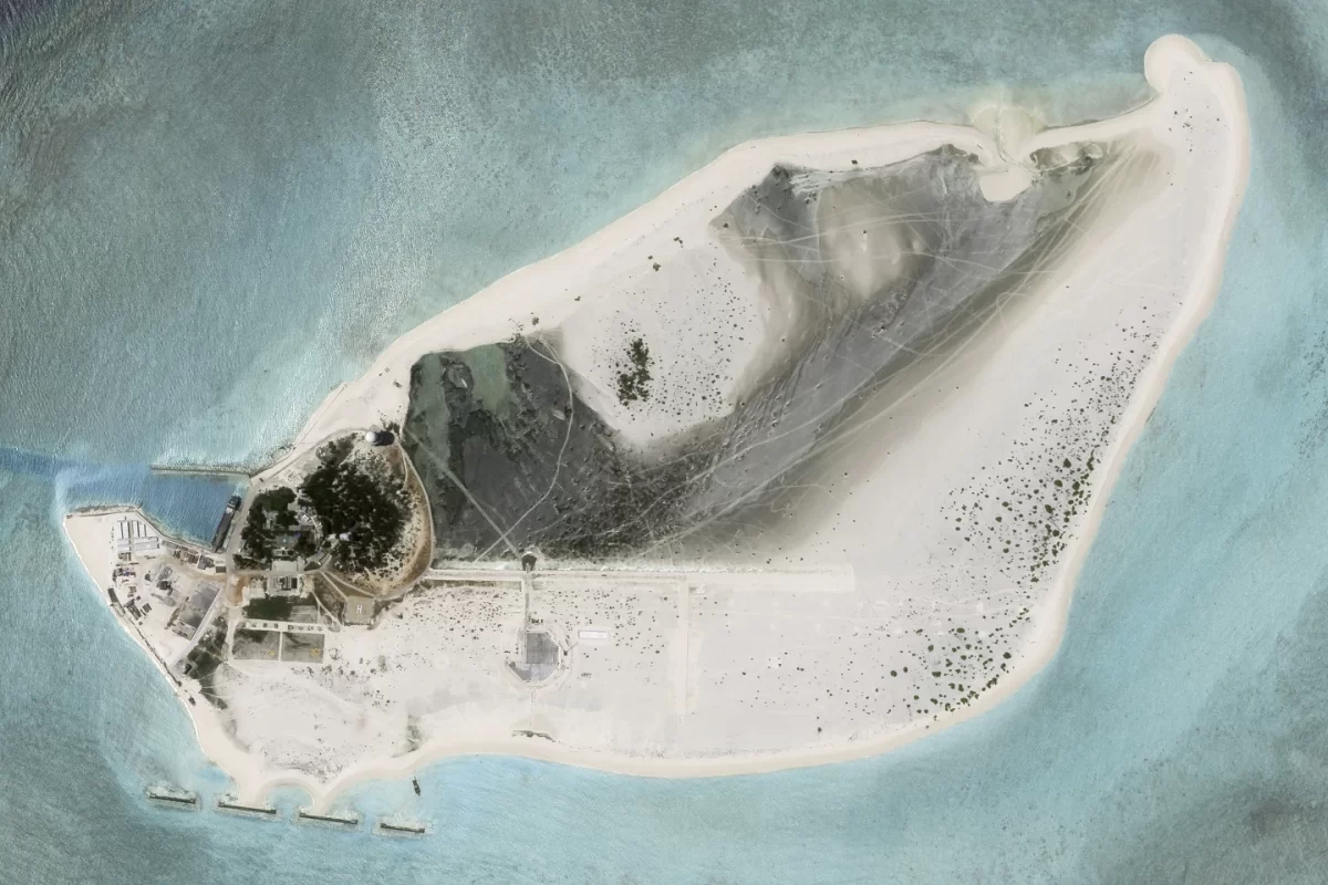 A Satellite Photo taken from Planet Labs PBC of Triton island in the South China Sea from Tuesday, Aug. 15 shows construction of an airstrip on the undisputed island. (Planet Labs PBC via AP)
