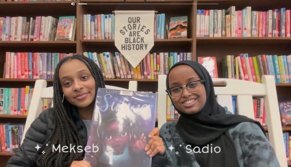 This photo shows Westerville North High School seniors Mekseb Girmay and Sadio Abdi recording themselves reading the book, “Sulwe,” by Lupita Nyong’o for elementary school students.
