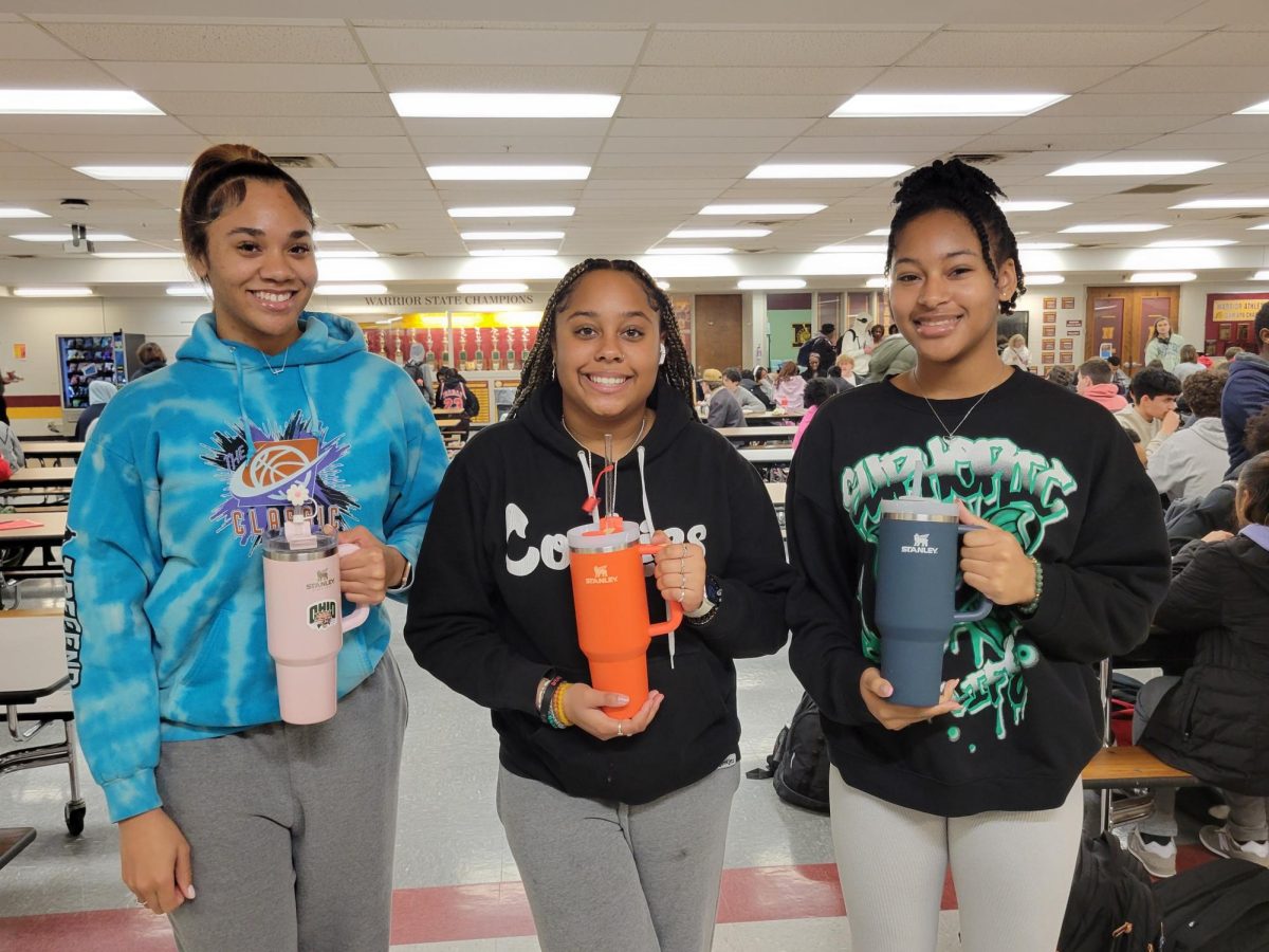 Westerville North students hold up their Stanley Water Bottles. These cups are the current trend for teenagers to have world wide.