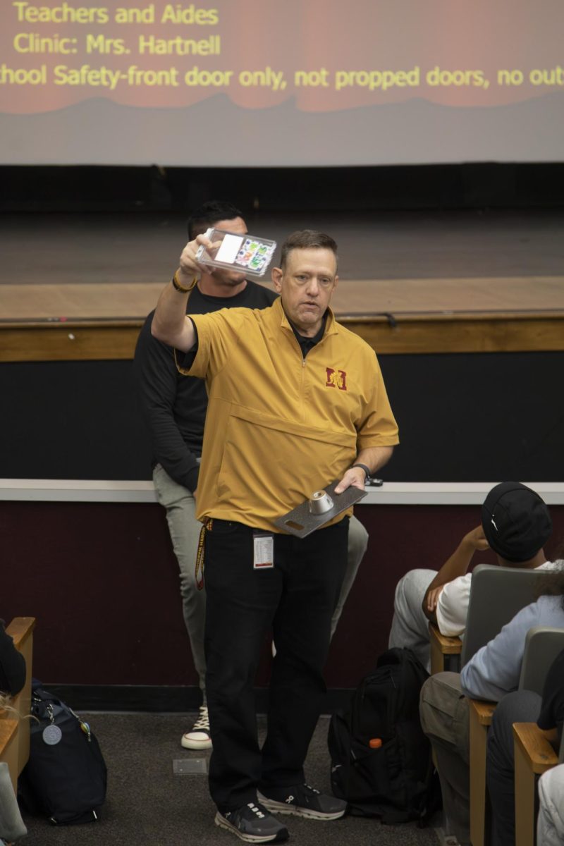 North Principal, Kurt Yancey, shows students the lockable phone case during class meetings this week.