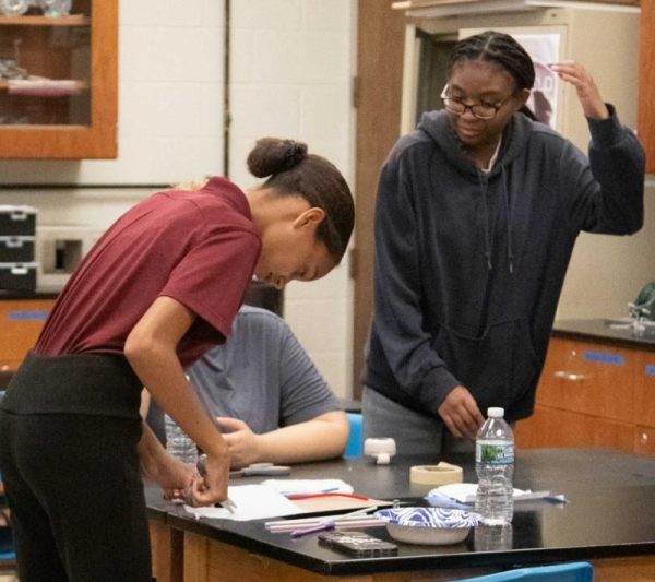 Gabby Christian (2027), left, designs a bobsled for the first engineering challenge.