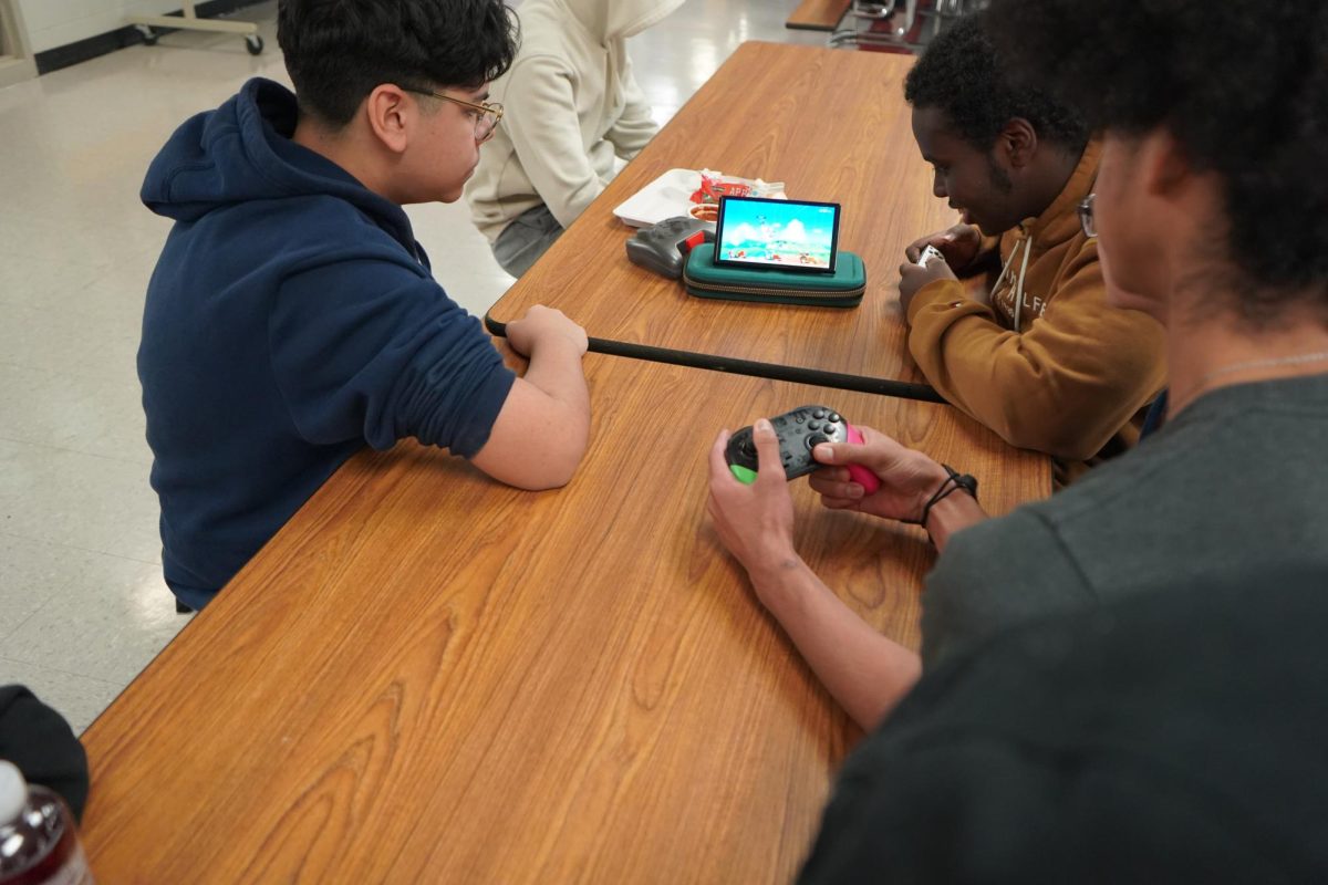 Passing the time on the sticks: Two freshmen devote their time and energy to Legends of Zelda everyday. They said it is an easier way to bond with each other rather than sit[ting] and talk[ing] and look[ing]. 
